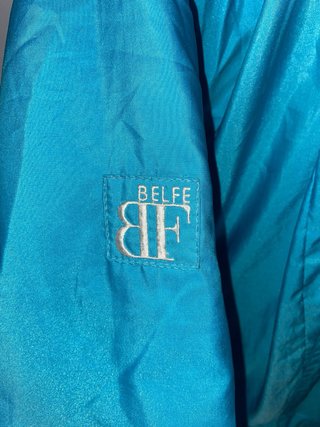 Chaqueta azul turquesa estilo bomber