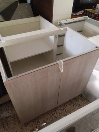 Cucina angolare legno e acciaio