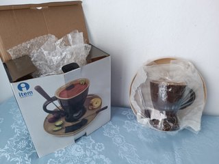 Fondue de cerámica nueva