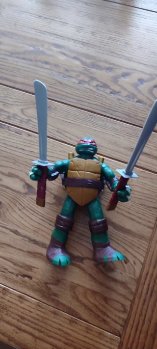 Figura Tortuga Ninja Raphael con Sai