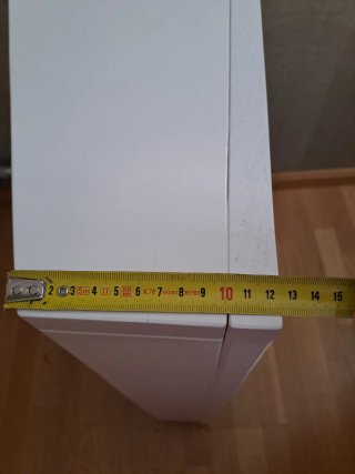 Mueble esquinero blanco con puerta