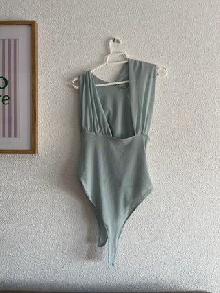 Blusa azul satinada manga larga