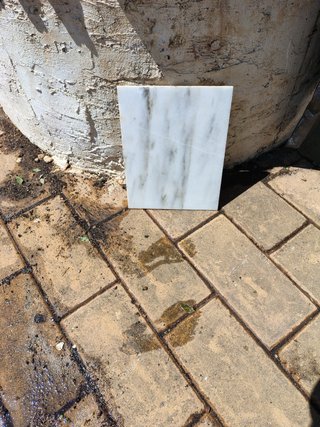 Losa de mármol blanco veteado
