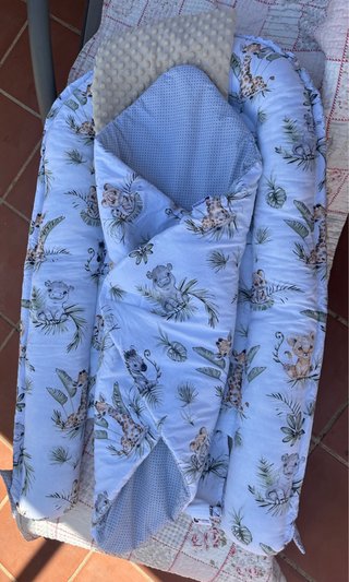 Nido reductor de cuna con estampado de animales