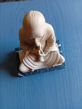Figura cerámica músico con flauta