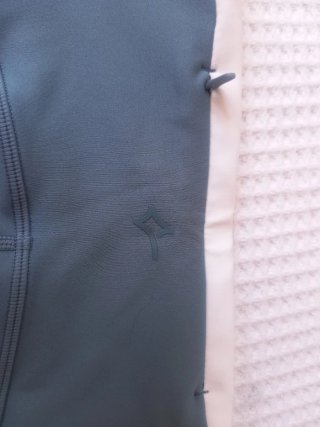 Conjunto deportivo teal y blanco