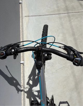 Bicicleta Rockrider plateada y azul