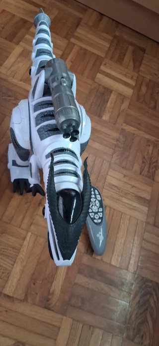 T-Rex con mando y lanzador de flechas