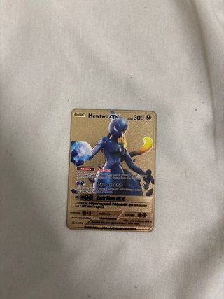 Mewtwo GX Carta Pokémon Dorada