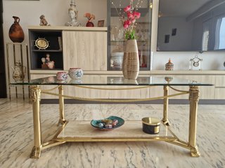 Mesa de centro cristal y metal con travertino