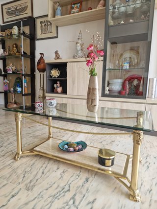 Mesa de centro cristal y metal con travertino