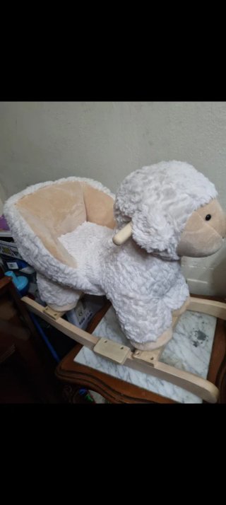 Oveja balancín peluche