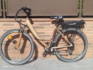 Bicicleta Eléctrica Fotona dorada