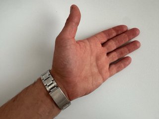 Reloj de pulsera acero inoxidable y esfera negra