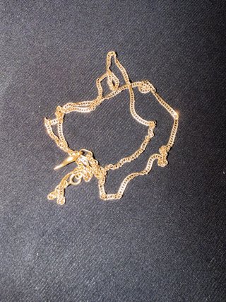 Cadena dorada trenzada con colgante oro 18