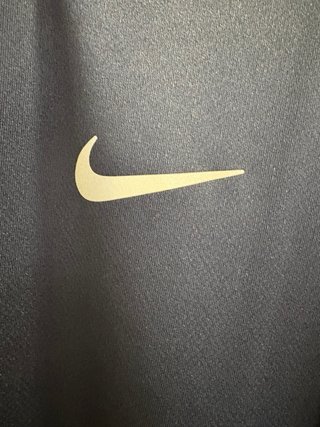 Camiseta running Nike azul media cremallera