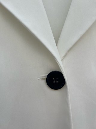 Blusa body elegante blanca con botón