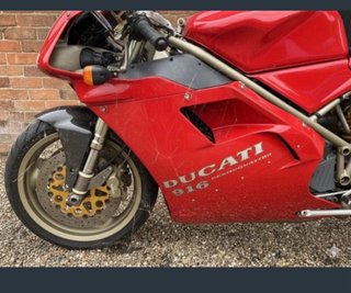 Cuidado! Ducati 916 SPS Roja