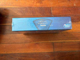 Trivial Pursuit Fiesta Juego de Mesa