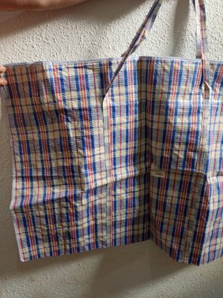 Bolsa de almacenamiento de ropa a cuadros