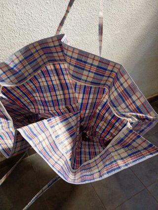 Bolsa de almacenamiento de ropa a cuadros