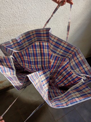 Bolsa de almacenamiento de ropa a cuadros