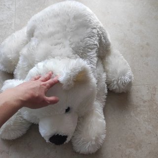 Oso de peluche blanco.