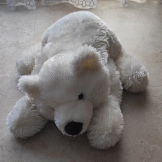 Oso de peluche blanco.