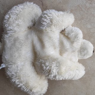 Oso de peluche blanco.