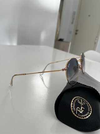 Gafas de sol Ray-Ban redondas doradas