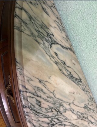 Recibidor clásico mármol y madera