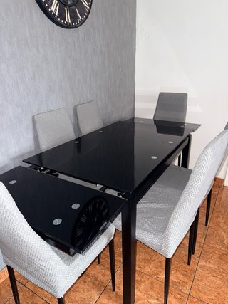 Mesa de comedor extensible cristal negra y sillas