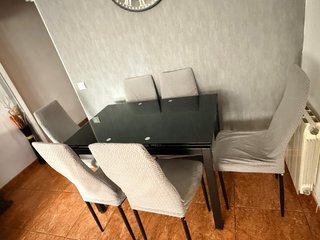 Mesa de comedor extensible cristal negra y sillas