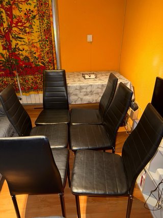 Mesa de comedor extensible cristal negra y sillas