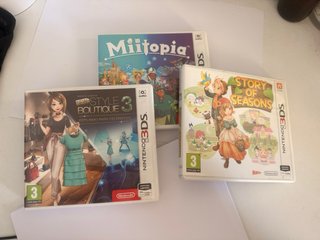 Nintendo 2DS XL Nero/Blu + Giochi + Caricatore