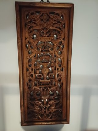 Talla de madera decorativa oriental