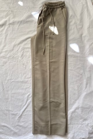 Pantalón Zara fluido pernera ancha beige