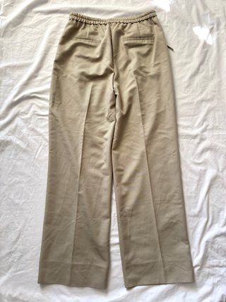 Pantalón Zara fluido pernera ancha beige