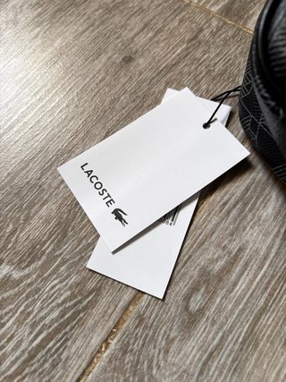 Bolso bandolera Lacoste monograma