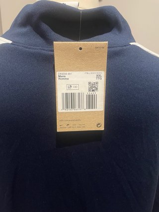 Sudadera deportiva Nike azul y blanca