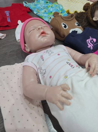 Muñeca Reborn + muñeca y lote