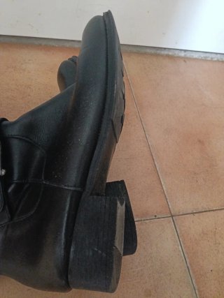 Botas altas negras con hebillas
