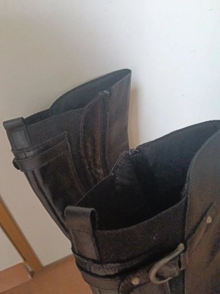 Botas altas negras con hebillas