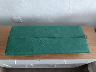 Cojín medio rulo polipiel verde
