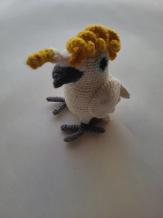 Peluche de loro crochet hecho a mano