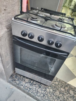 Cocina de gas con horno 4 fuegos