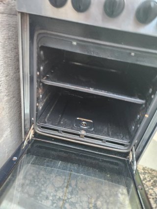 Cocina de gas con horno 4 fuegos