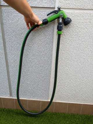 Pistola de riego con manguera y adaptador