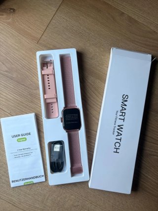 Smartwatch rosa con correa plateada