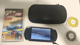 PSP con custodia e 3 giochi